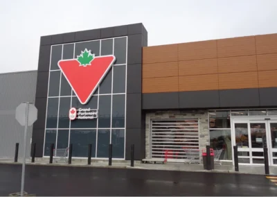 Canadian Tire Kirkland, Québec Understanding construction phasing is crucial for renovations around operating stores, and GetReal develops site concept designs with engineering input that address operational needs, existing site constraints, and elements like public access and loading dock functionality.